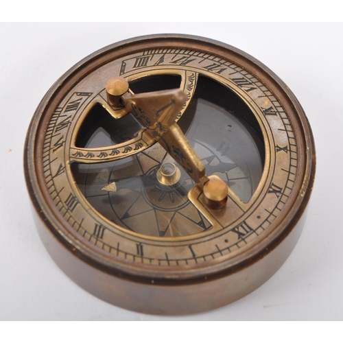 351 - A bronzed metal cased combination sundial compass. The screw lid being engraved with 'The Mary Rose ... 