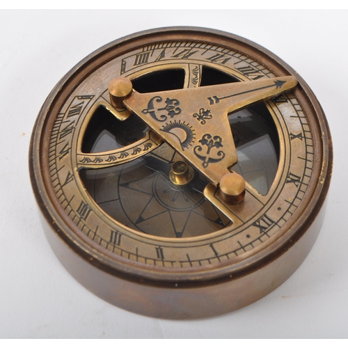 351 - A bronzed metal cased combination sundial compass. The screw lid being engraved with 'The Mary Rose ... 