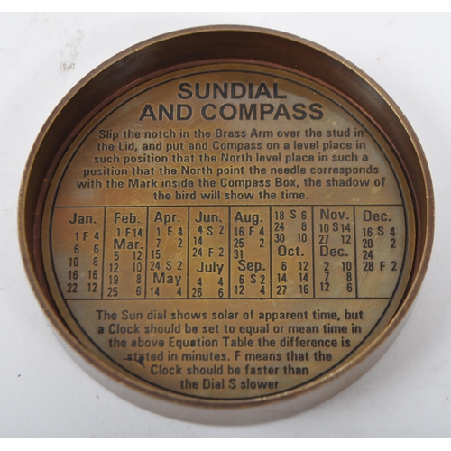 351 - A bronzed metal cased combination sundial compass. The screw lid being engraved with 'The Mary Rose ... 