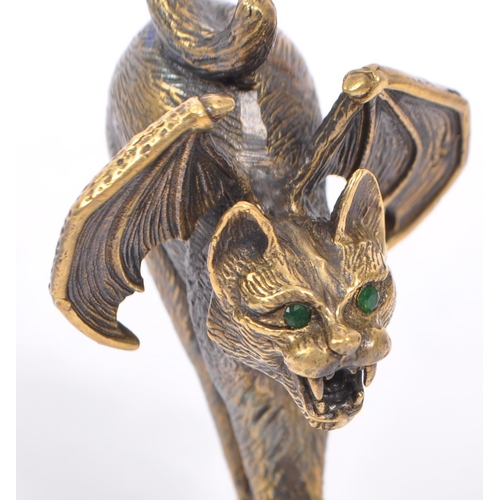 353 - A bronzed metal wax seal in the form of a winged cat modelled with hackles up bearing thangs with fa... 