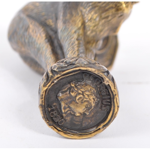 353 - A bronzed metal wax seal in the form of a winged cat modelled with hackles up bearing thangs with fa... 