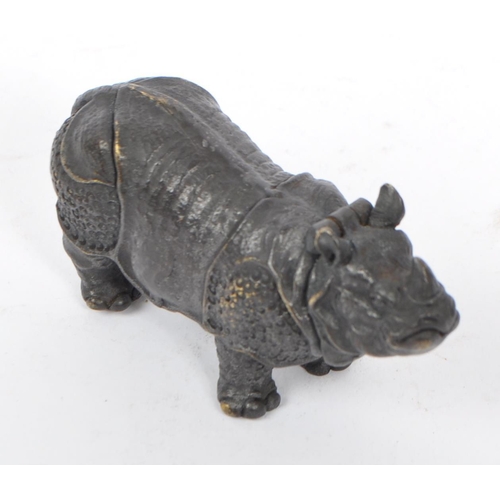 358 - A bronzed metal vesta case in the form of a rhinoceros with hinge to head and match strike to underb... 