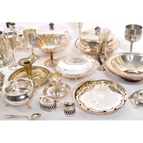 369 - A large collection of polished silver plated wares. To include, goblets, dishes, condiments, gravy b... 