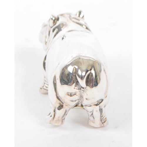 370 - A silver stamped 925 hippopotamus figure modelled standing and being stamped 925 sterling. Measures ... 