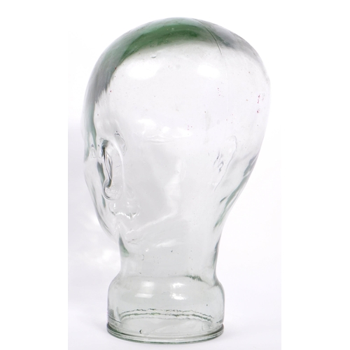 379 - A 20th century vintage pressed glass milliners bust / head in clear glass with bubbles present. Meas... 