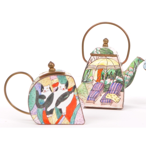 381 - Four late 20th century miniature enamel & brass tea pots / watering can by Empress Arts. Lot to incl... 