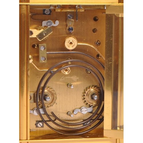 382 - A large 19th century French brass carriage clock. The clock having handle to top with case having ha... 