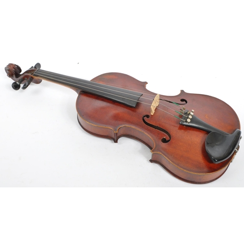 404 - An early 20th century circa 1900 French full 4/4 two piece violin with pair of bows. The violin havi... 