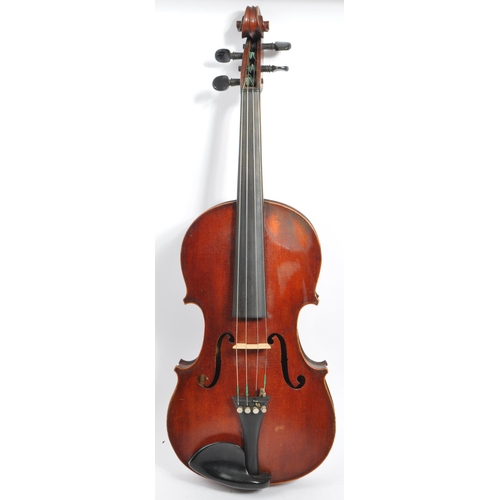 404 - An early 20th century circa 1900 French full 4/4 two piece violin with pair of bows. The violin havi... 