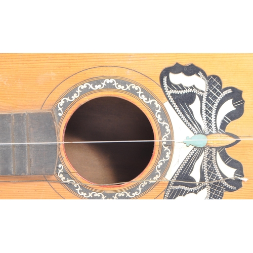 410 - An early 20th century Italian (Catania) guitar in the style of Ermelinda Silvestri / Fratelli Indeli... 