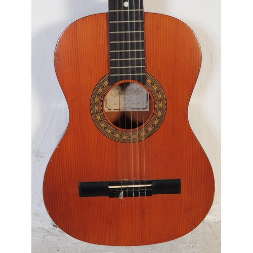 427 - Two mid century / vintage acoustic six string guitars by Encore & Guitarras Angeles. Both shaped wit... 