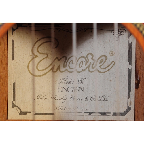 427 - Two mid century / vintage acoustic six string guitars by Encore & Guitarras Angeles. Both shaped wit... 