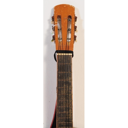 427 - Two mid century / vintage acoustic six string guitars by Encore & Guitarras Angeles. Both shaped wit... 