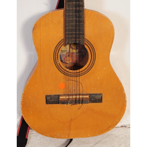 427 - Two mid century / vintage acoustic six string guitars by Encore & Guitarras Angeles. Both shaped wit... 