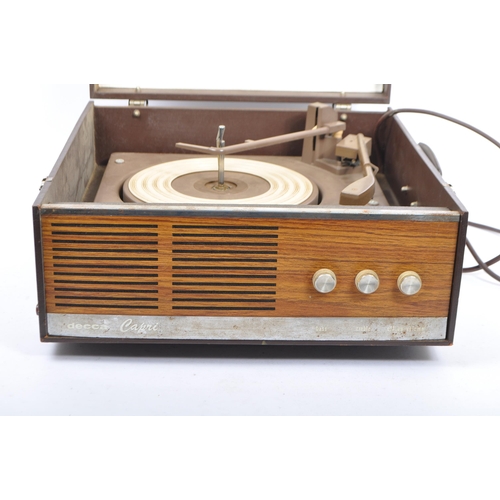 429 - A vintage Decca Capri BSR (Better Sound Reproduction) record player. AC Mains / Model No. RP199 in a... 