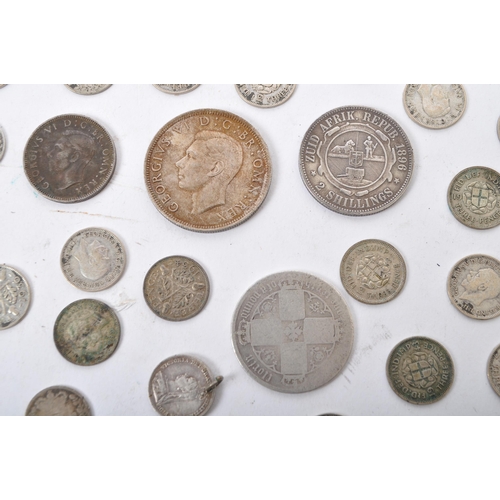 458 - A collection of silver United Kingdom George V three pence coins circa 1930s. Also including 1896 So... 