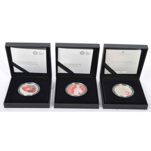 469 - The Royal Mint - The Remembrance Day - A collection of three United Kingdom cased silver proof five ... 