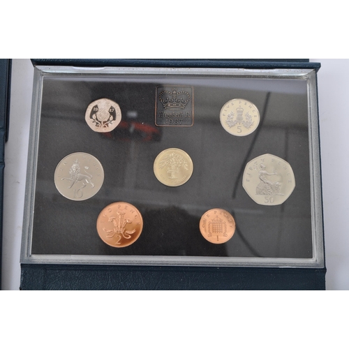 505 - The Royal Mint - United Kingdom proof coin collection. To include the years, 1983, 1985, 1986, 1987,... 