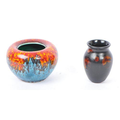 51 - Poole Pottery - Two pieces of Poole Pottery to include a Sea Fire pattern vase alongside a Black Sta... 