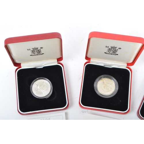 521 - A collection of late 20th century UK Royal Mint silver proof coins. Including two 1996 silver proof ... 