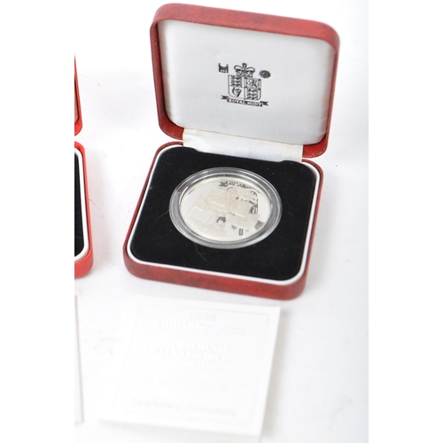 521 - A collection of late 20th century UK Royal Mint silver proof coins. Including two 1996 silver proof ... 