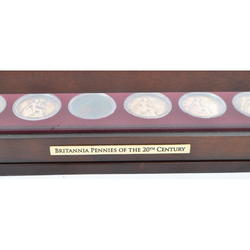 527 - A cased collection of 20th century Victorian / Britannia veiled head copper penny coins. To include ... 