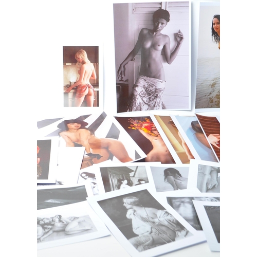 545 - A collection of fifty six / 56 art glamour press nude erotic photographs. A mixed selection of both ... 