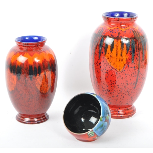 55 - Poole Pottery - Lava - Three pieces of 20th century Poole Pottery to include two vases in the Lava f... 