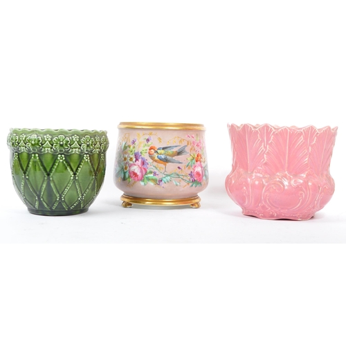 56 - Three vintage ceramic planters / plant pots with a variation on designs. A hand painted multi colour... 