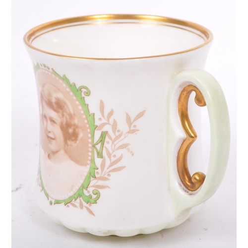 69 - Of Royal Interest - A 1937 Princess Elizabeth Royal Doulton porcelain mug with E handle. Printed wit... 