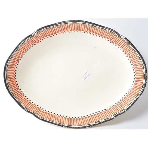 8 - Wedgwood - Creamware - A 19th century pierced ceramic serving / display plate. Of oval form with rep... 