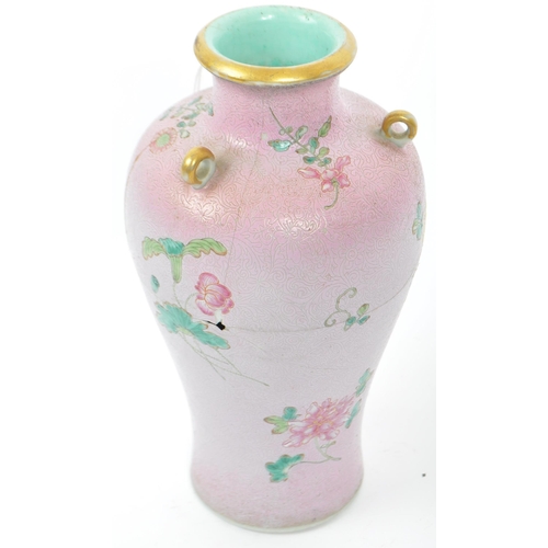 80 - An 18th century Qing Dynasty Chinese famille rose vase. The vase having pink foliate ground with han... 