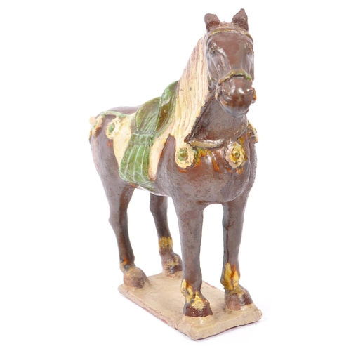 82 - An early 20th century circa 1920s 1930s Chinese Tang Dynasty reproduction horse figure. The figure h... 