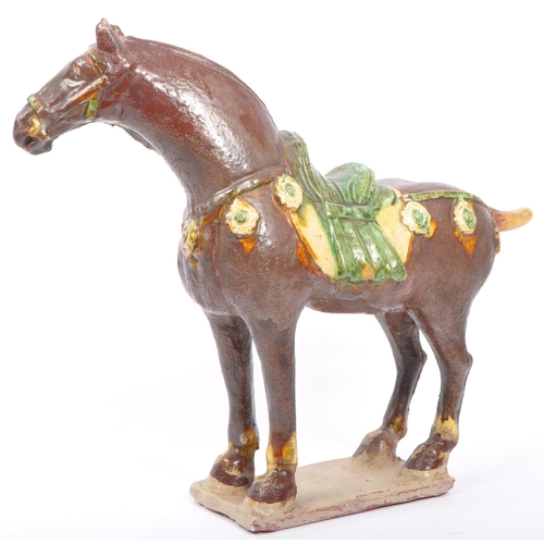 82 - An early 20th century circa 1920s 1930s Chinese Tang Dynasty reproduction horse figure. The figure h... 