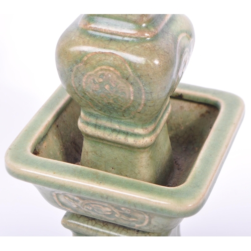 85 - A large 19th century Chinese Wacai Gu form archaic style ceramic green glazed candlestick. The candl... 