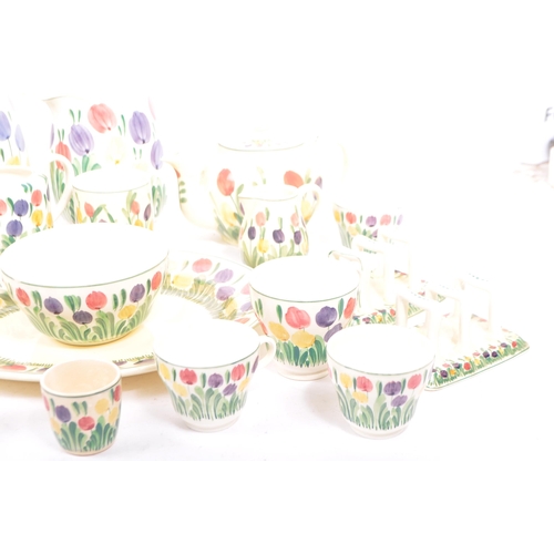 87 - Of local interest - Bristol & Pountney & Co England. Amberone pattern with hand painted tulip flower... 