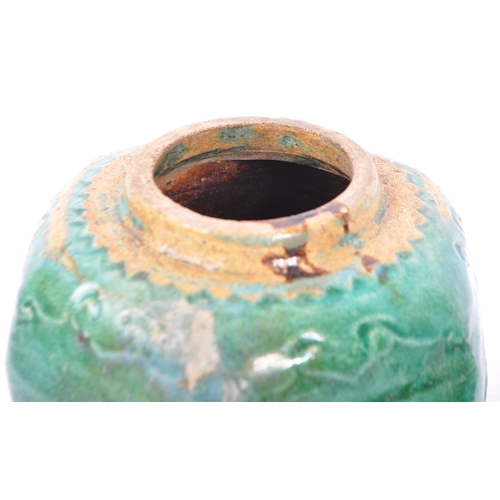 88 - A 19th century Chinese earthenware green glazed ginger jar and bowl. The ginger jar being of octagon... 