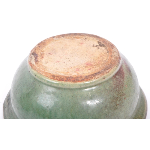 88 - A 19th century Chinese earthenware green glazed ginger jar and bowl. The ginger jar being of octagon... 