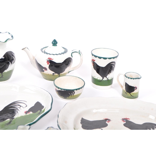 89 - A early 20th century Bristol Pountney's Cock & Hen pattern pottery tea service set. Comprising of te... 