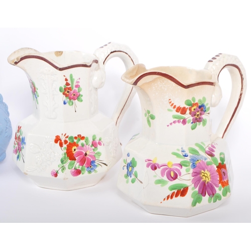 93 - Of Bristol Interest - A collection of 5 19th century and later ceramic pottery jugs. With hand paint... 