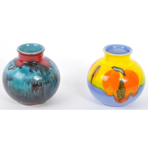 95 - Poole Pottery - Two contemporary studio art pottery vases. One in the Matisse pattern and another in... 