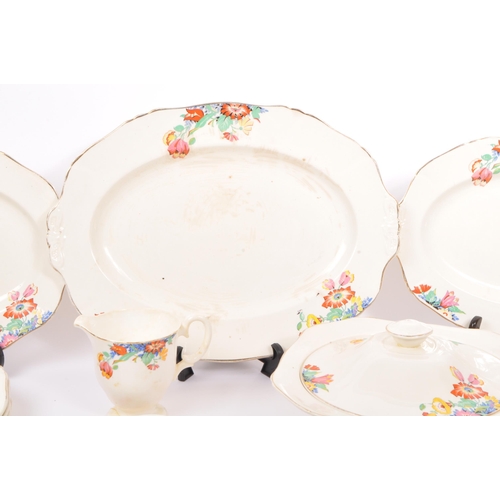 75 - A collection of vintage 20th century Alfred Meakin china cake plates, dinner plates, lidded tureens,... 