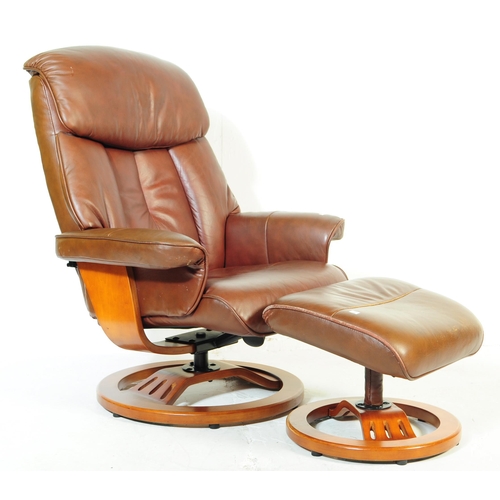 599 - A retro mid 20th century Ekornes stressless style reclining swivel armchair. Having a rectangular cu... 