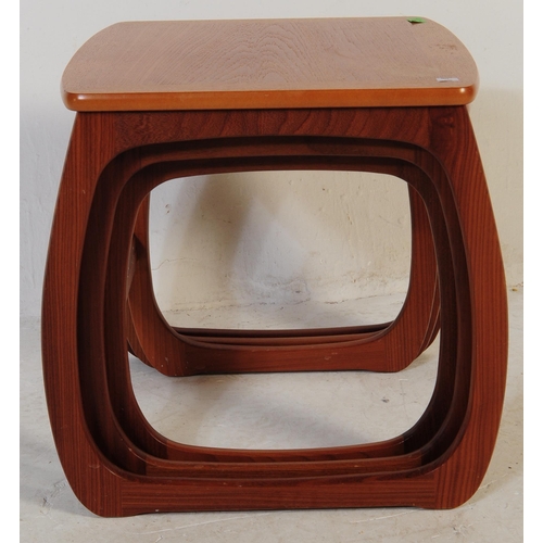 600 - Nathan Furniture for Parker Knoll - A vintage late 20th century circa 1980s nest of teak tables. Rec... 