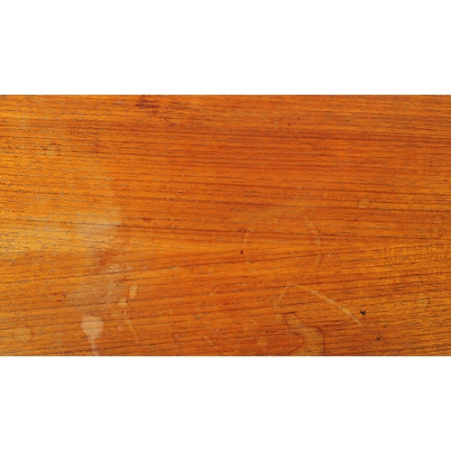 601 - Meredew Furniture - A vintage 20th century teak wood sideboard credenza. Of rectangular shape with a... 