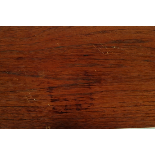 602 - British Modern Design - Vintage 20th century teak sideboard credenza. Of rectangular form with a ban... 