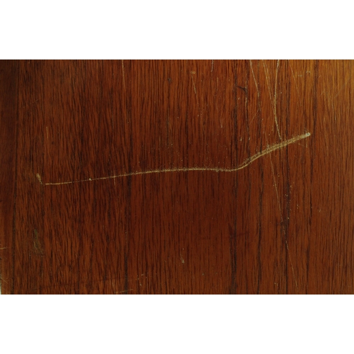 602 - British Modern Design - Vintage 20th century teak sideboard credenza. Of rectangular form with a ban... 