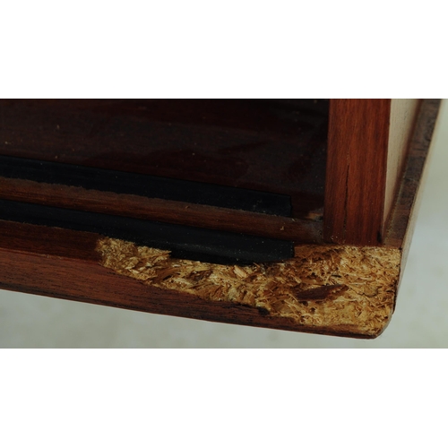 602 - British Modern Design - Vintage 20th century teak sideboard credenza. Of rectangular form with a ban... 