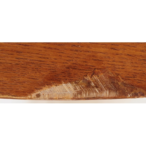 603 - A retro mid 20th century teak dining table with chairs. The table of circular form with round suppor... 