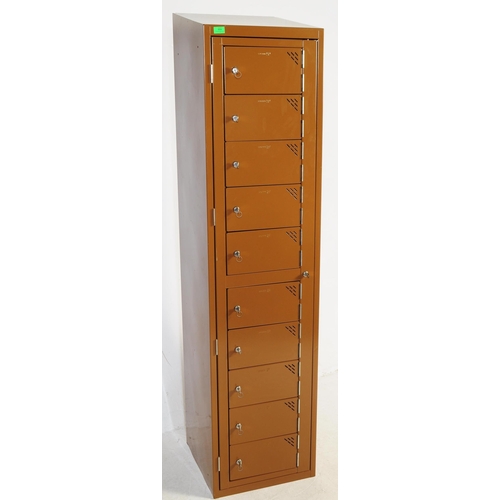 604 - A contemporary Sperrin SP upright metal pedestal locker cabinet. Industrial form with brown enamel p... 
